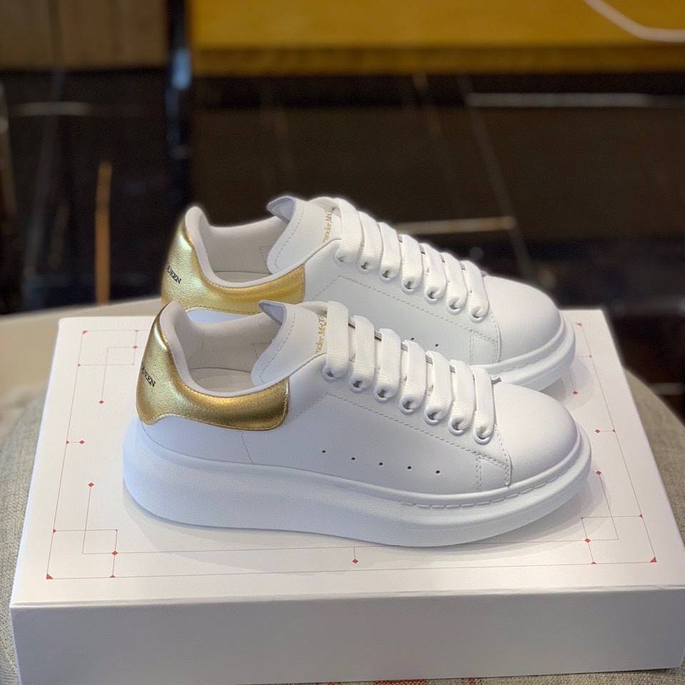 Alexander McQueen MQ Gold cowhide tail Sneakers