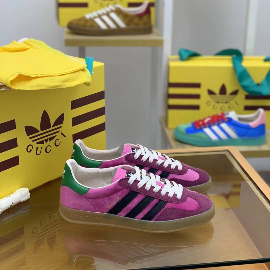 GU*I× Adidas sneakers